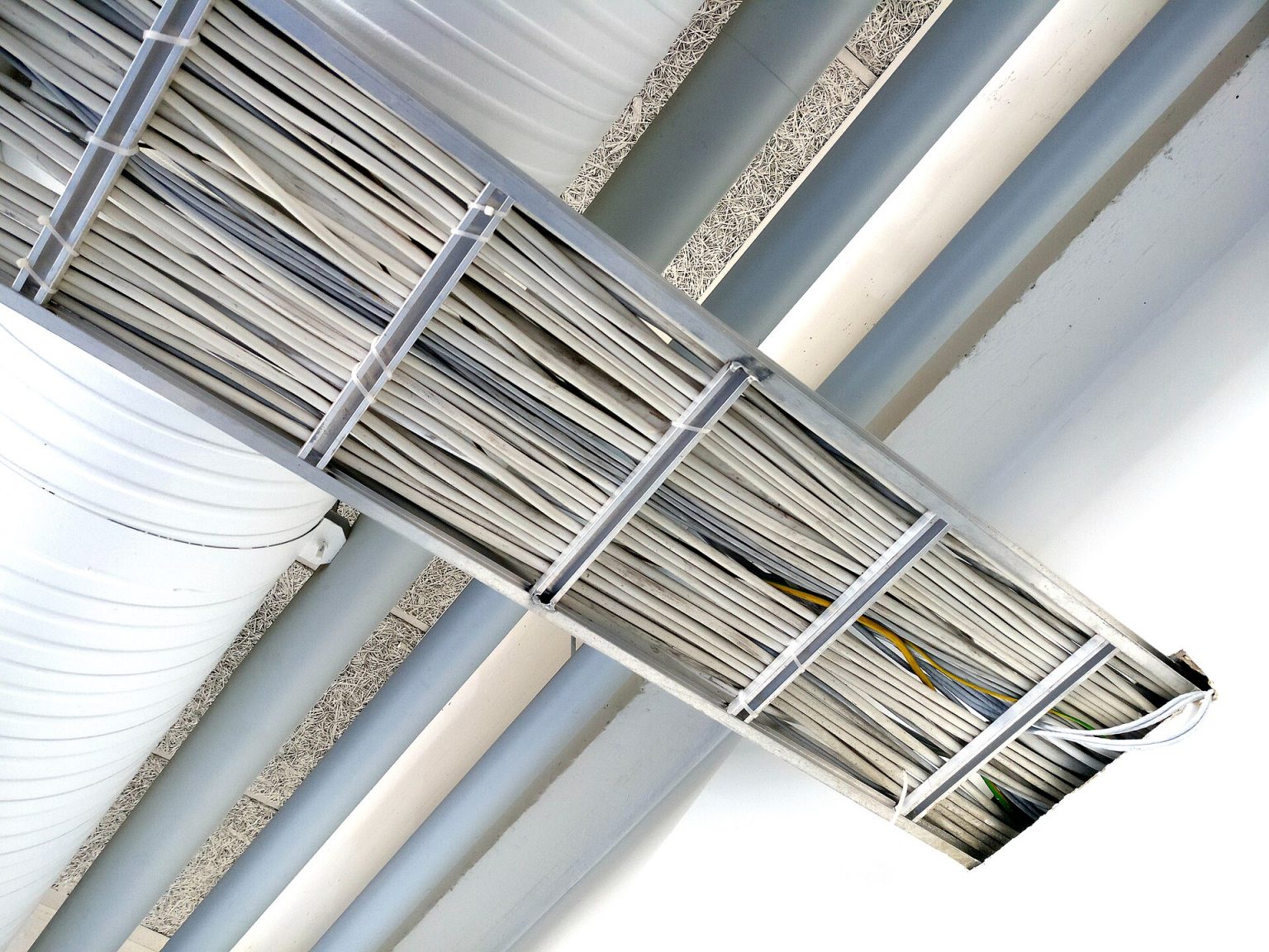 Cable tray and containment in a plant area