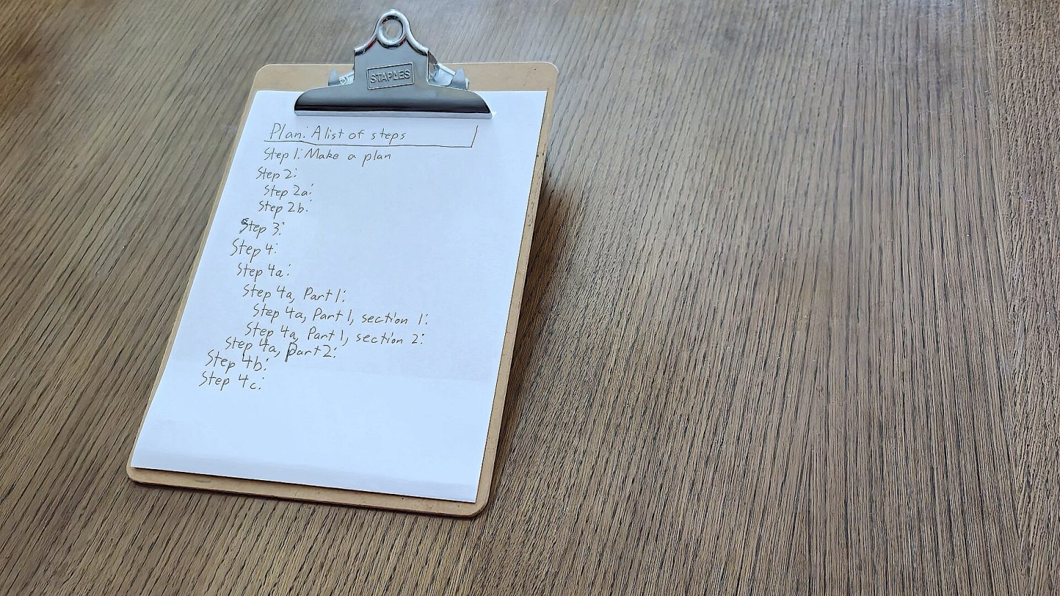 Engineer reviewing an inspection checklist on site
