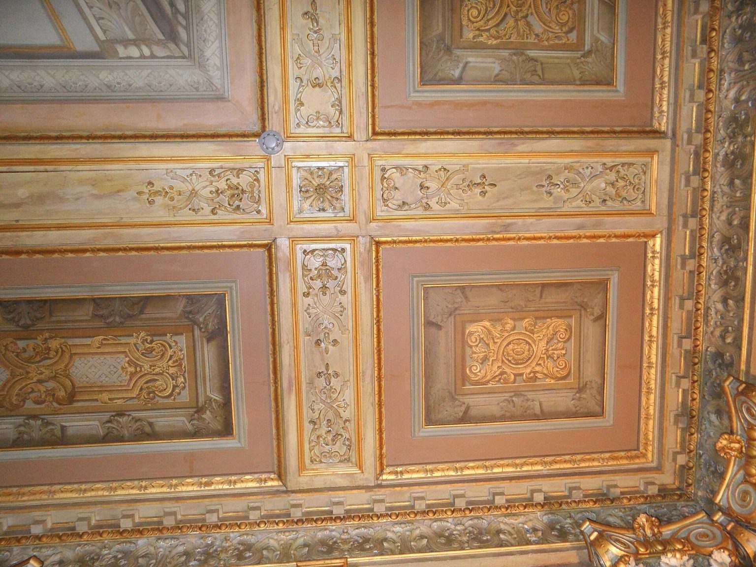 Ceiling-mounted smoke detector in a commercial building